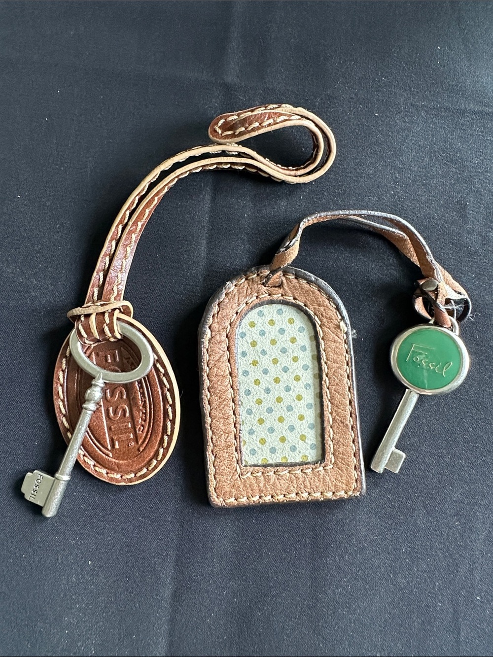 Fossil EUC leather purse key tags. Choice of two: Skeleton key or name tag